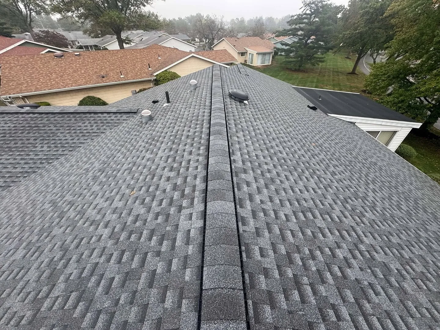 New grey shingle roof installation near Rumson, NJ